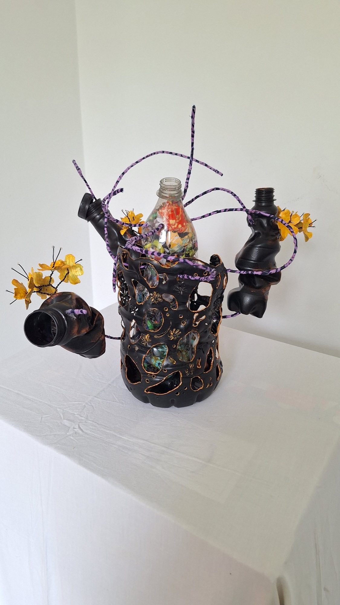 Sculpture piece, reclaimed plastics and wire